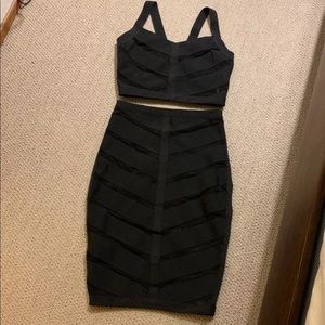 Black sleeveless bandage body con dress